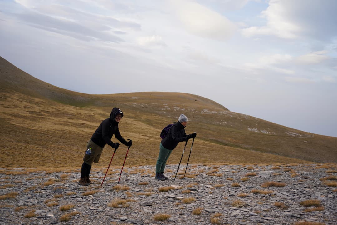 Hikers on windy mountain
